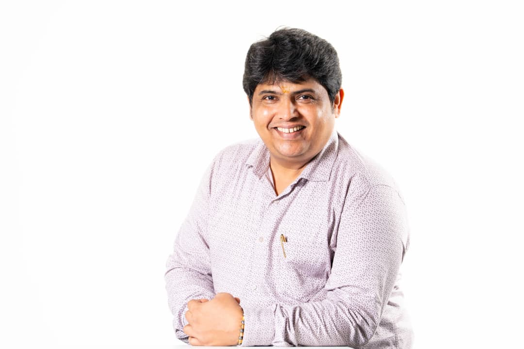 Dr. Suresh Pujari