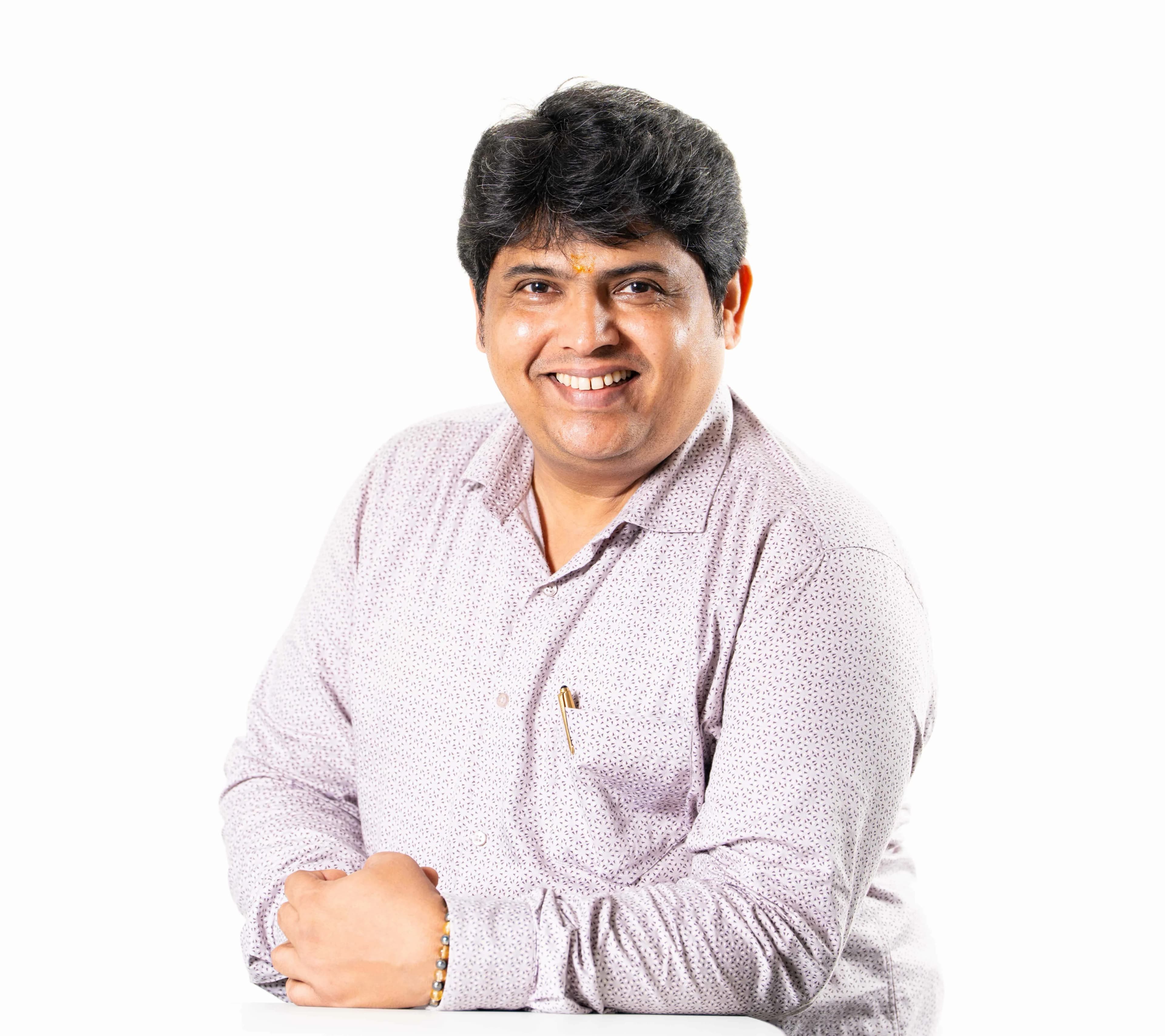 Dr. Suresh Pujari